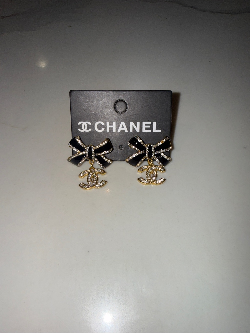 Black and Gold Bow CC Crystal Drop Earrings